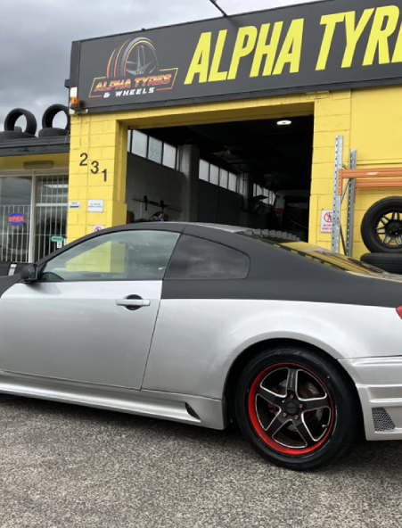 Silver sports car with new wheels